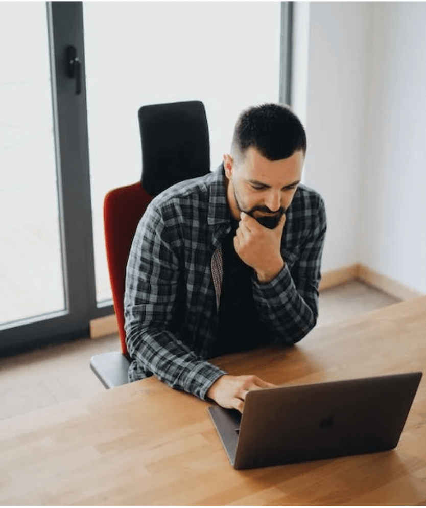 man using laptop