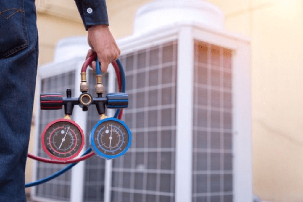 technician checking air conditioner