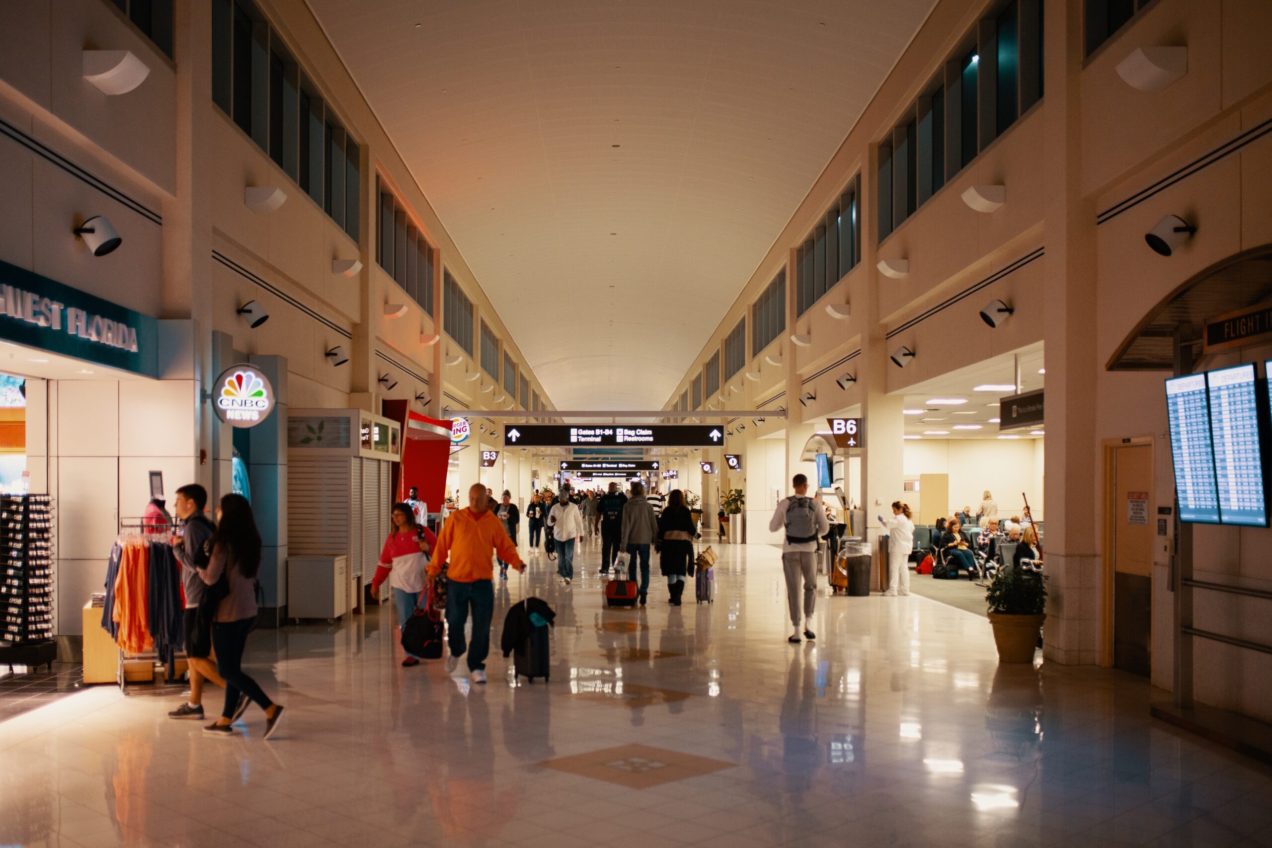 people at the airport scaled